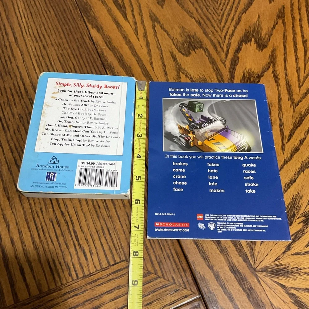 Books: Wheels on Bus, Tools Rule, I Grow Up, Daniel Tiger, Lego Superhero, Poky